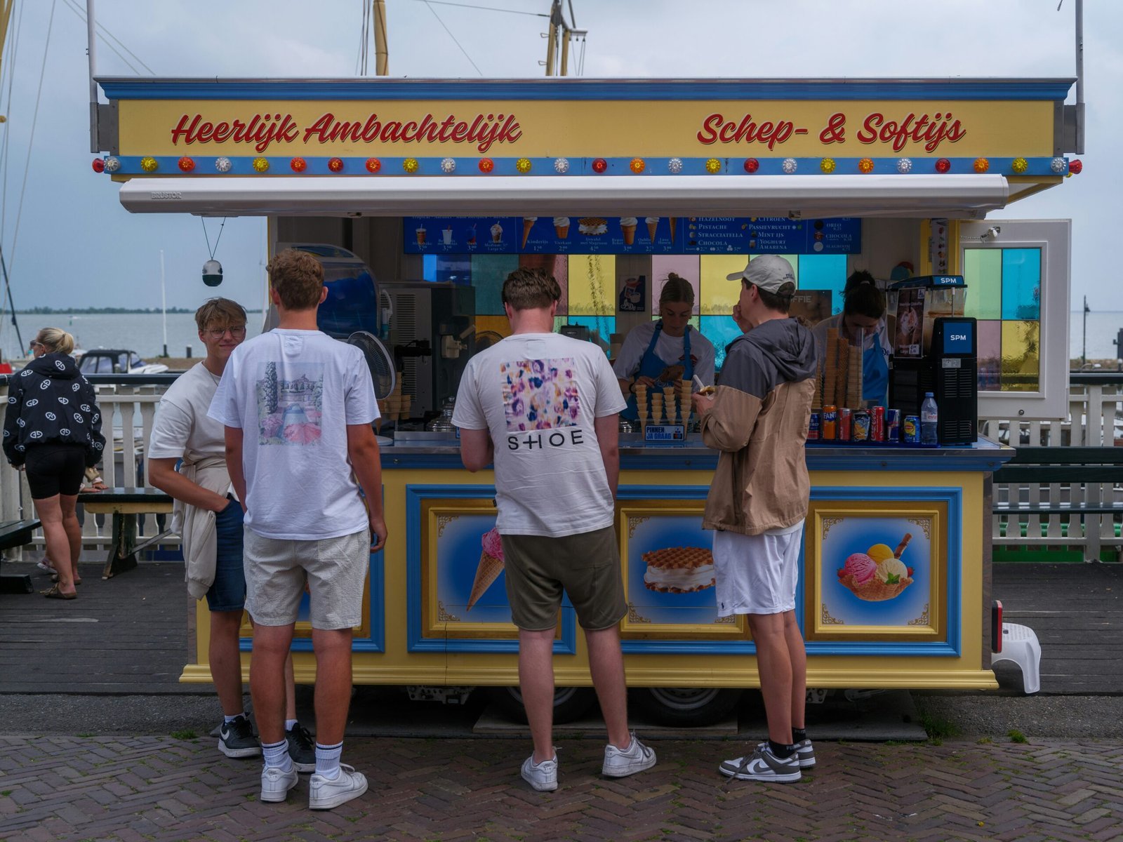 Colorful Kona Ice of Hardin Valley/Clinton/Powell Knoxville TN truck serving shaved ice at a sunny community event.